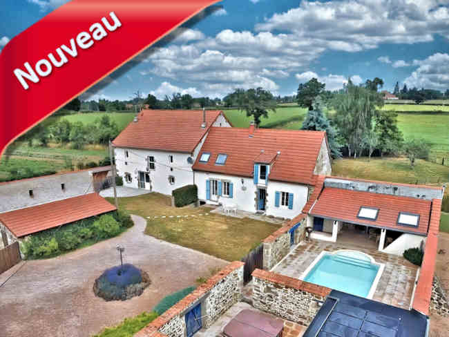 Propriété 3 habitations vendre en Combrailles: maison, 2 gîtes 3 étoiles; 3700 m² de parc: piscine, jardins, cuisine d’été, sauna, jacuzzi, terrasses, garages